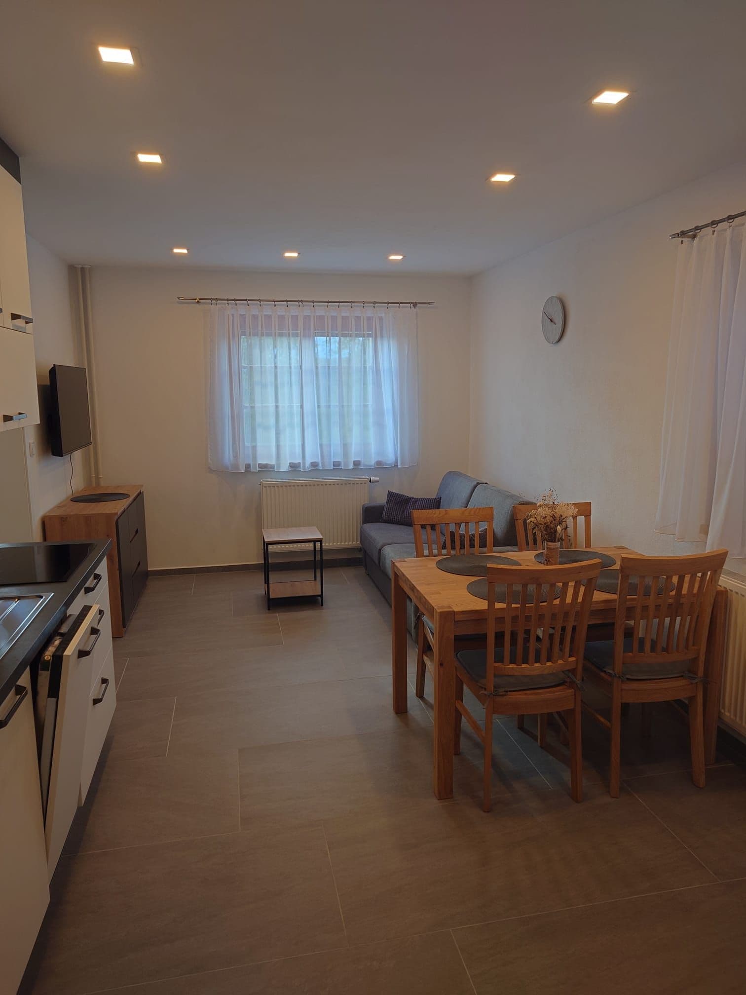 Living area with sofa and television